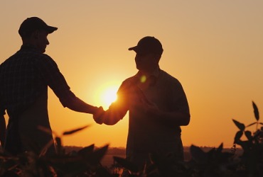Farmer shakes hands with his delivery guy after receiving a Diesel Delivery in Tazewell County IL